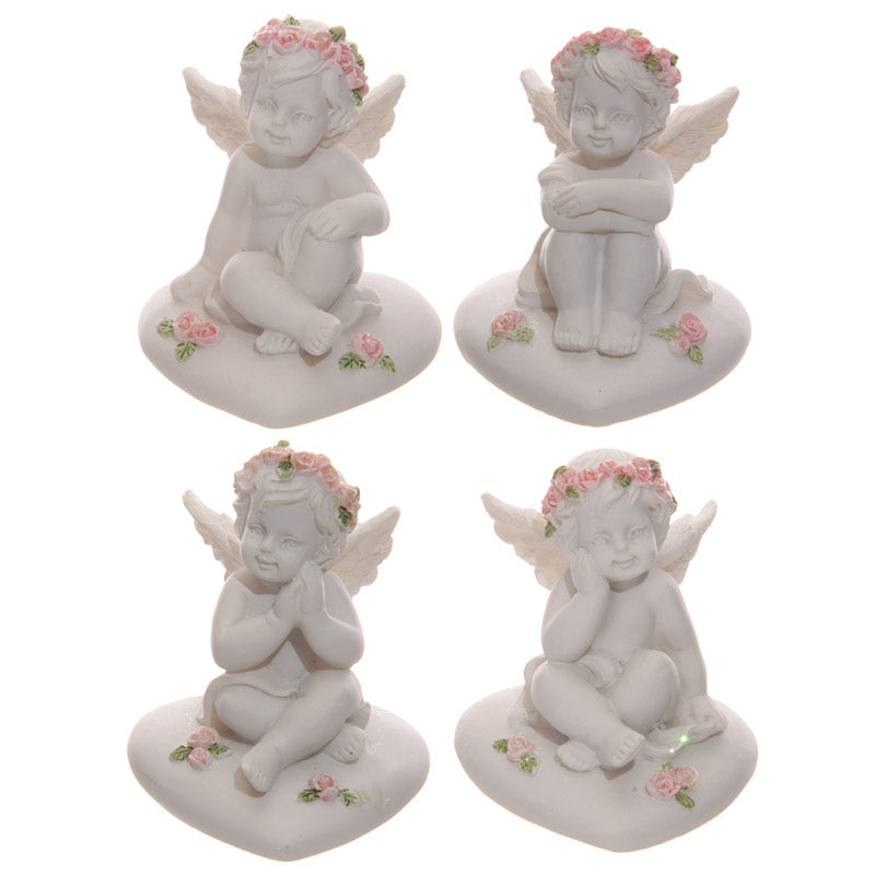 Collectable Cherub Sitting on Heart with Pink Roses