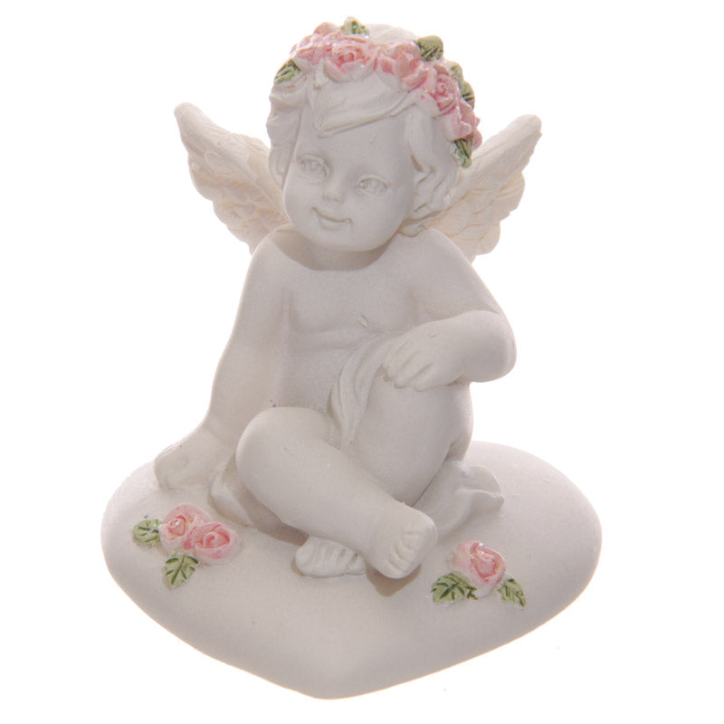 Collectable Cherub Sitting on Heart with Pink Roses